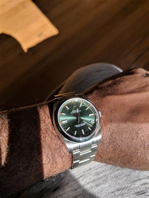 rolex oyster perpetual 34 green dial|rolex oyster perpetual green price.